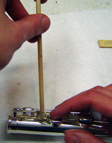 Feeler guage in use - holding the handle perpendicular and pull straight out